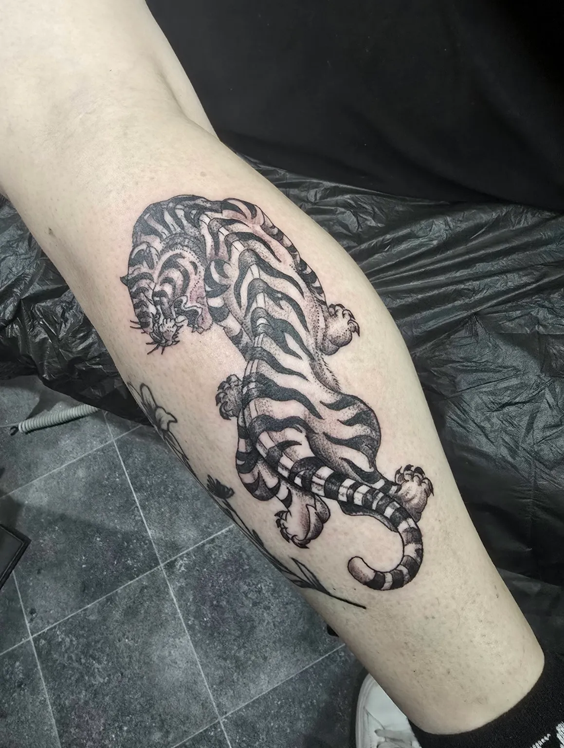 Black and grey tiger tattoo by LS Tattoo Collective
